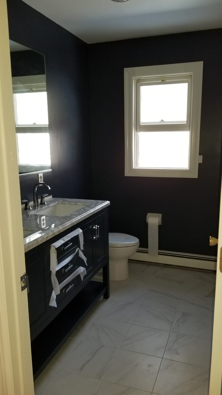 Lemus project photo: bathroom finishes.